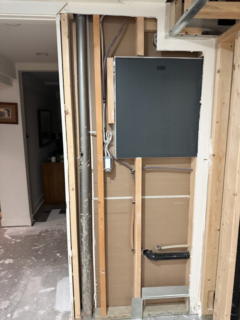 Basement insulation, drywall and painting project in Calgary by Renovo Painting Inc, during insulation and drywall work