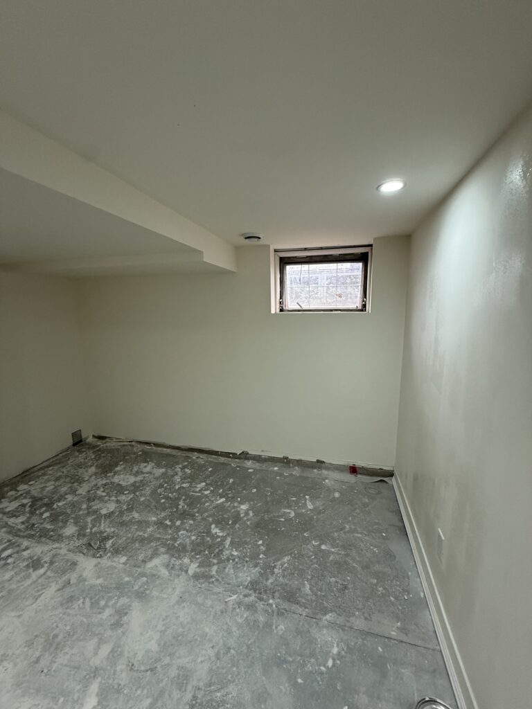 Basement insulation, drywall and painting project in Calgary by Renovo Painting Inc, finished painted basement walls