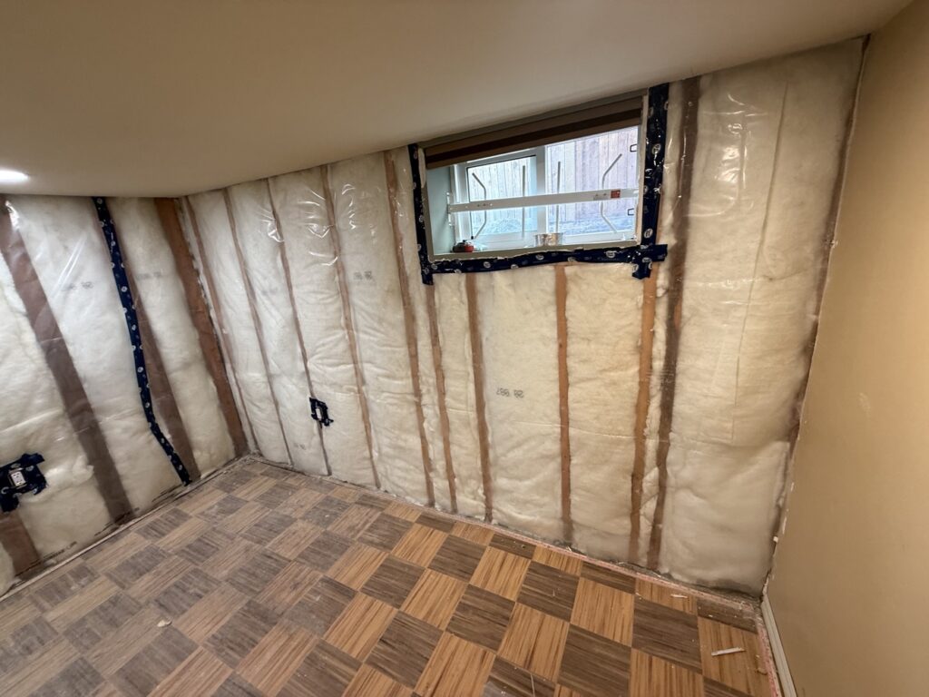 Basement insulation and vapour barrier installation in Calgary by Renovo Painting Inc