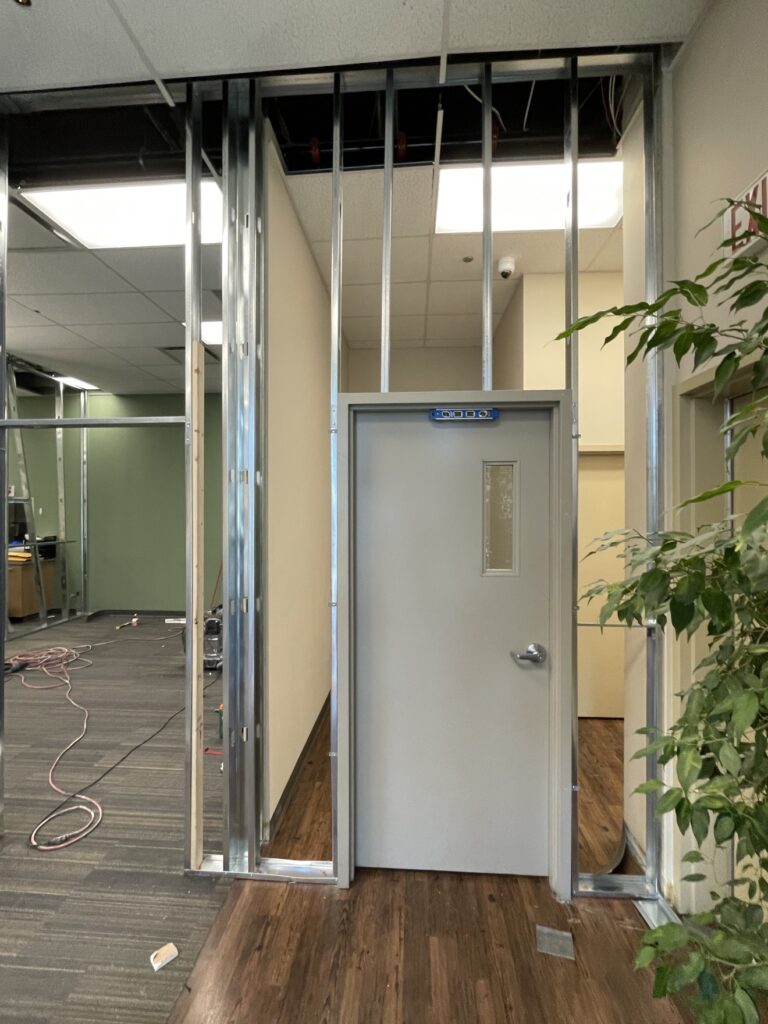 Commercial office build-out — framing and drywall by Renovo Painting Inc, Calgary