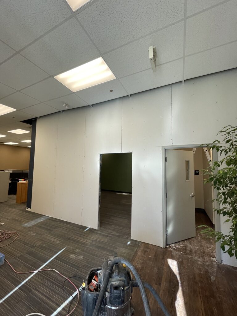 Commercial office build-out — framing and drywall by Renovo Painting Inc, Calgary