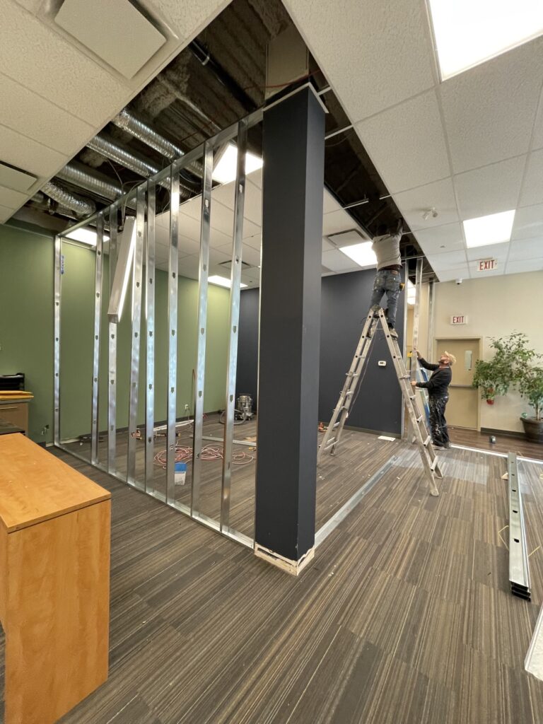 Commercial office build-out — framing and drywall by Renovo Painting Inc, Calgary