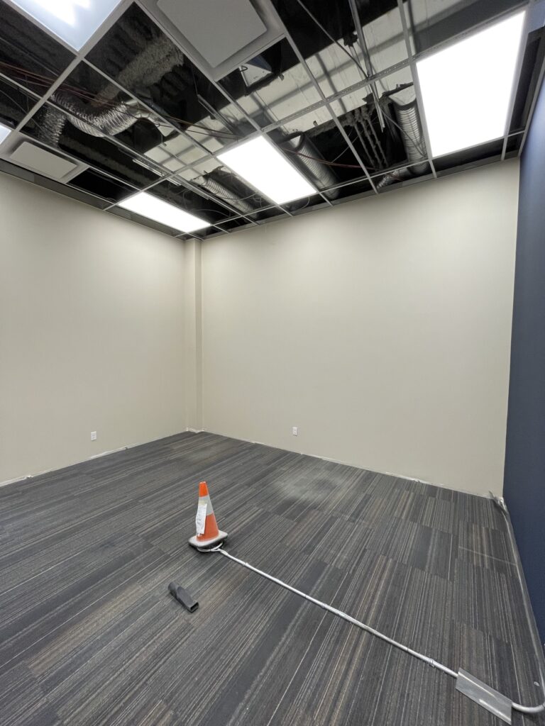 Office buildout room interior by Renovo Painting Inc, Calgary