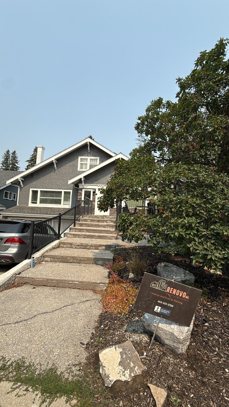 Stucco house exterior painted by Renovo Painting Inc in Calgary